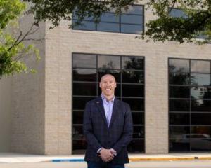 Dr. Matt Jackson, P.E, Dean of the Holland School of Sciences and Mathematics, stands outside Abilene Hall which houses HSU's engineering program.